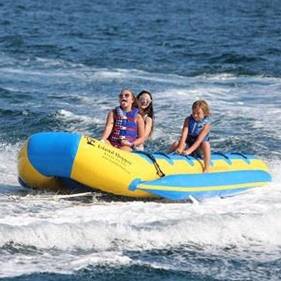 Kids on a banana boat ride in Destin / FWB ara