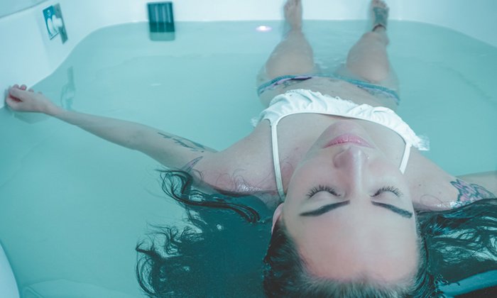 Woman floating in a spa