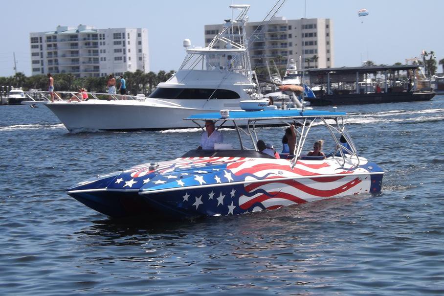 Dolphin tour thrill ride screaming eagle boat on the water