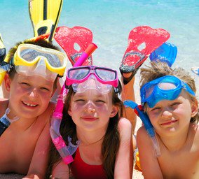 3 kids in snorkel gear