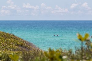 Enjoying water sports at Blue Mountain Beach in South Walton near our vacation rentals