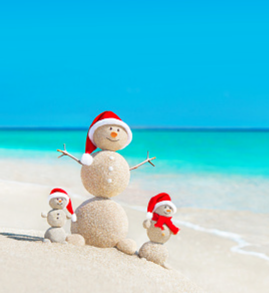 snowmen on the beach celebrating the holidays on 30A / Beaches of South Walton