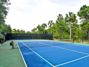 Gulf Place tennis court. Find 30A beach rentals with pool, tennis, shuffleboard, and a hot tub.